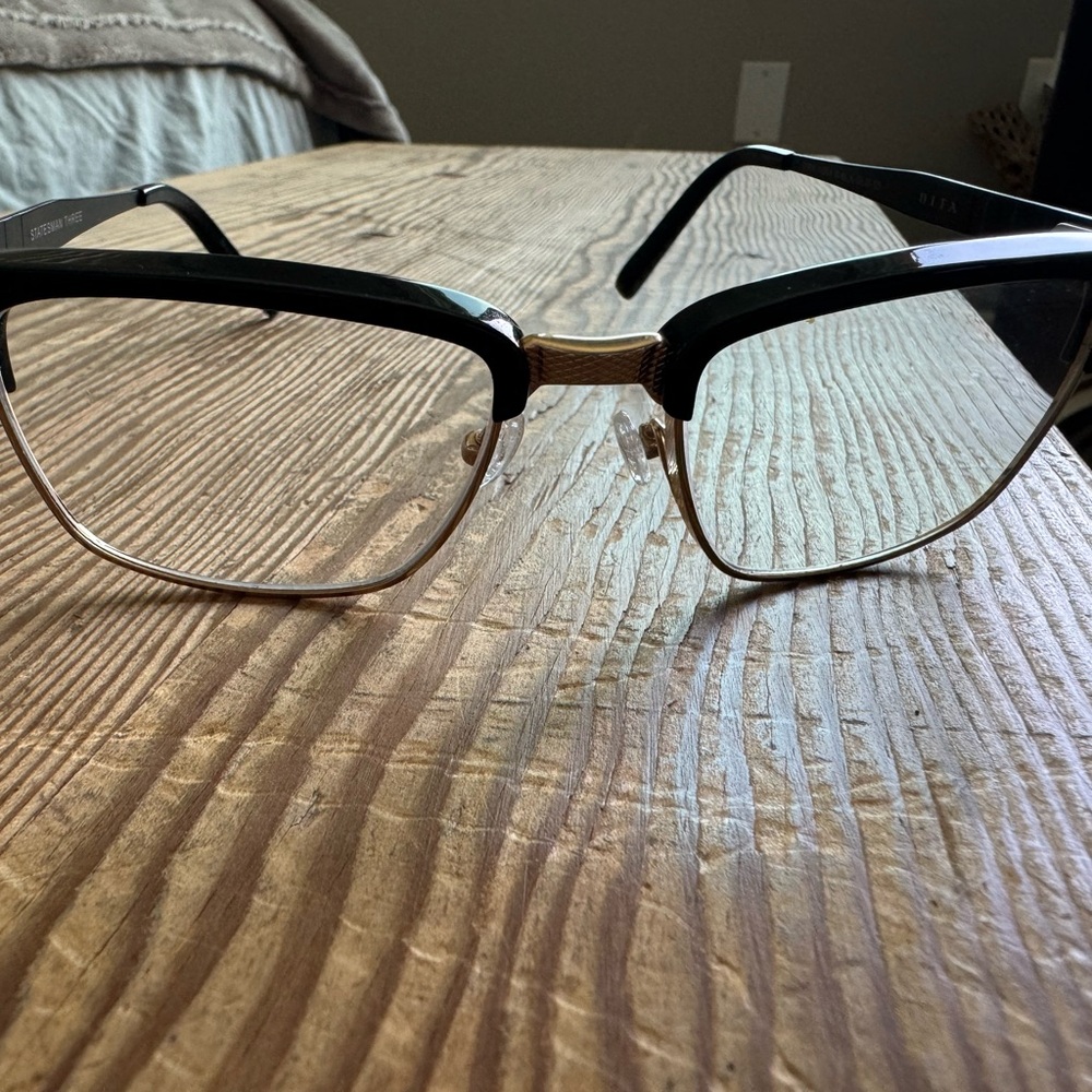 Dita frames black and gold. Prescription bifocals of 1.5